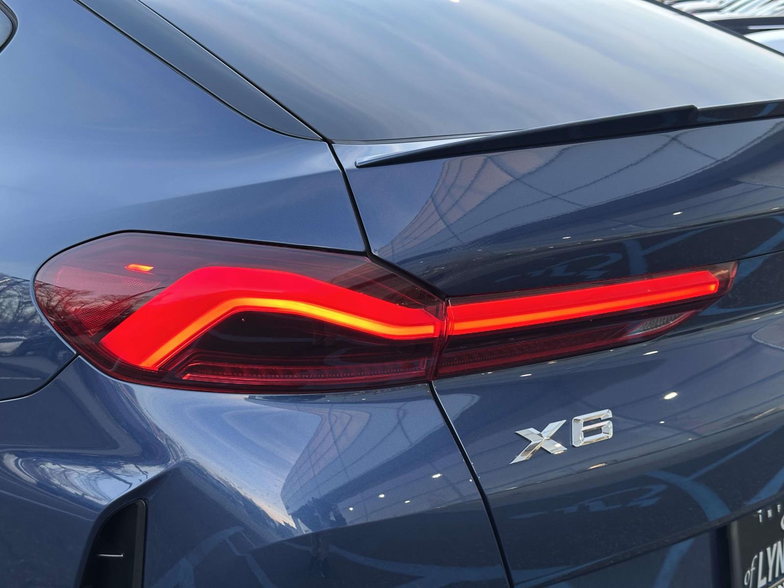 used 2023 BMW X6 car, priced at $52,947