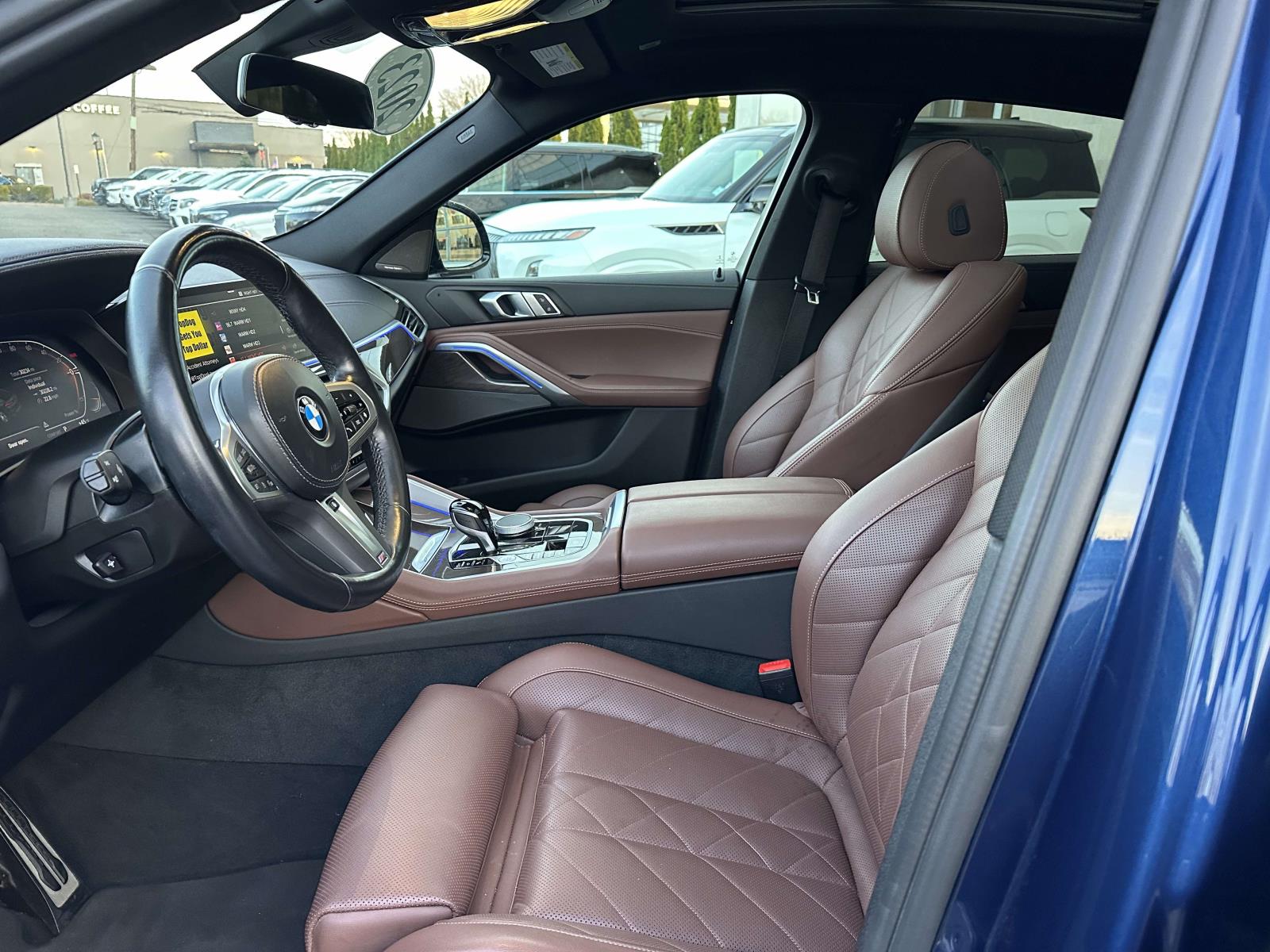 used 2023 BMW X6 car, priced at $52,947