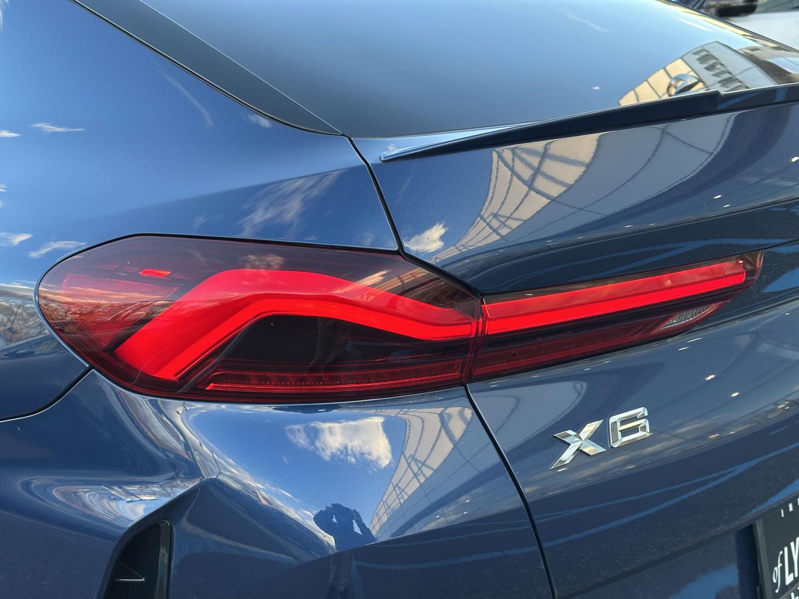 used 2023 BMW X6 car, priced at $53,550